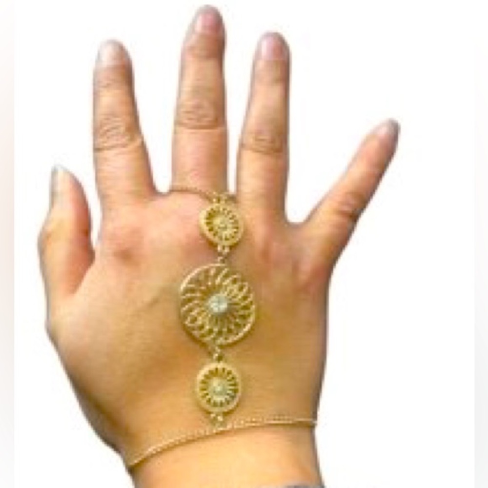 River Island (U.K brand) gold indian inspired bracelet with finger loop